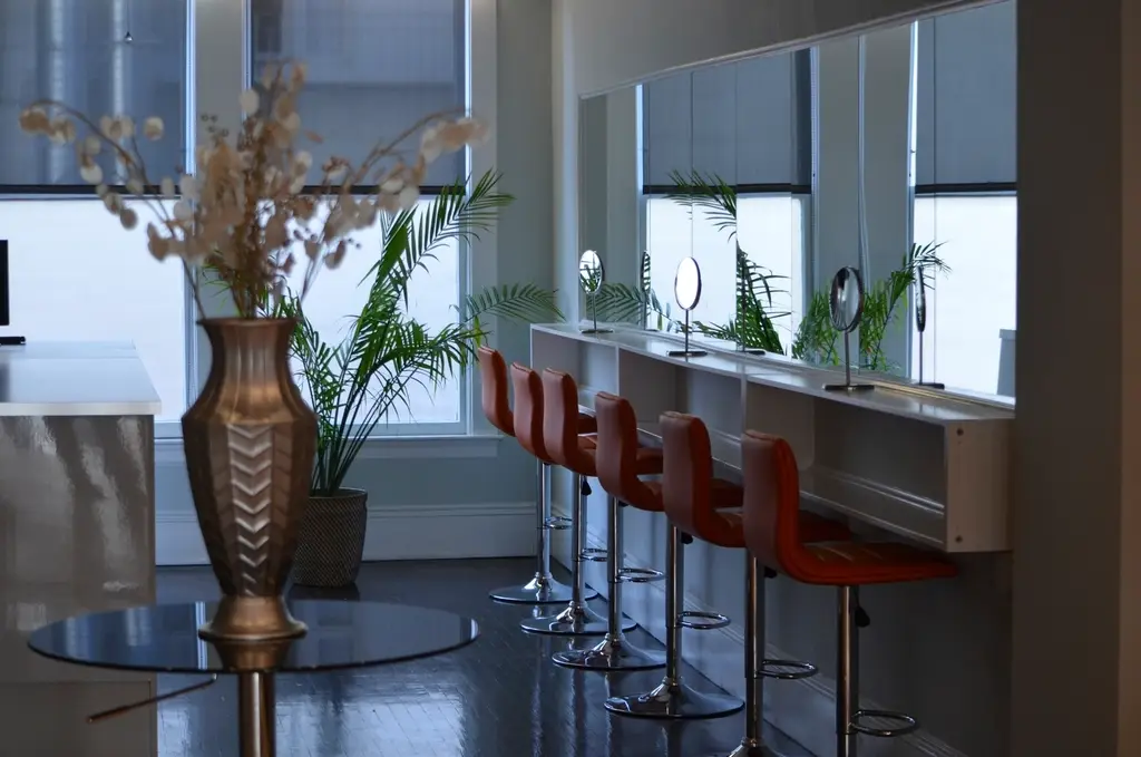 Hair salon interior with mirrors and chairs